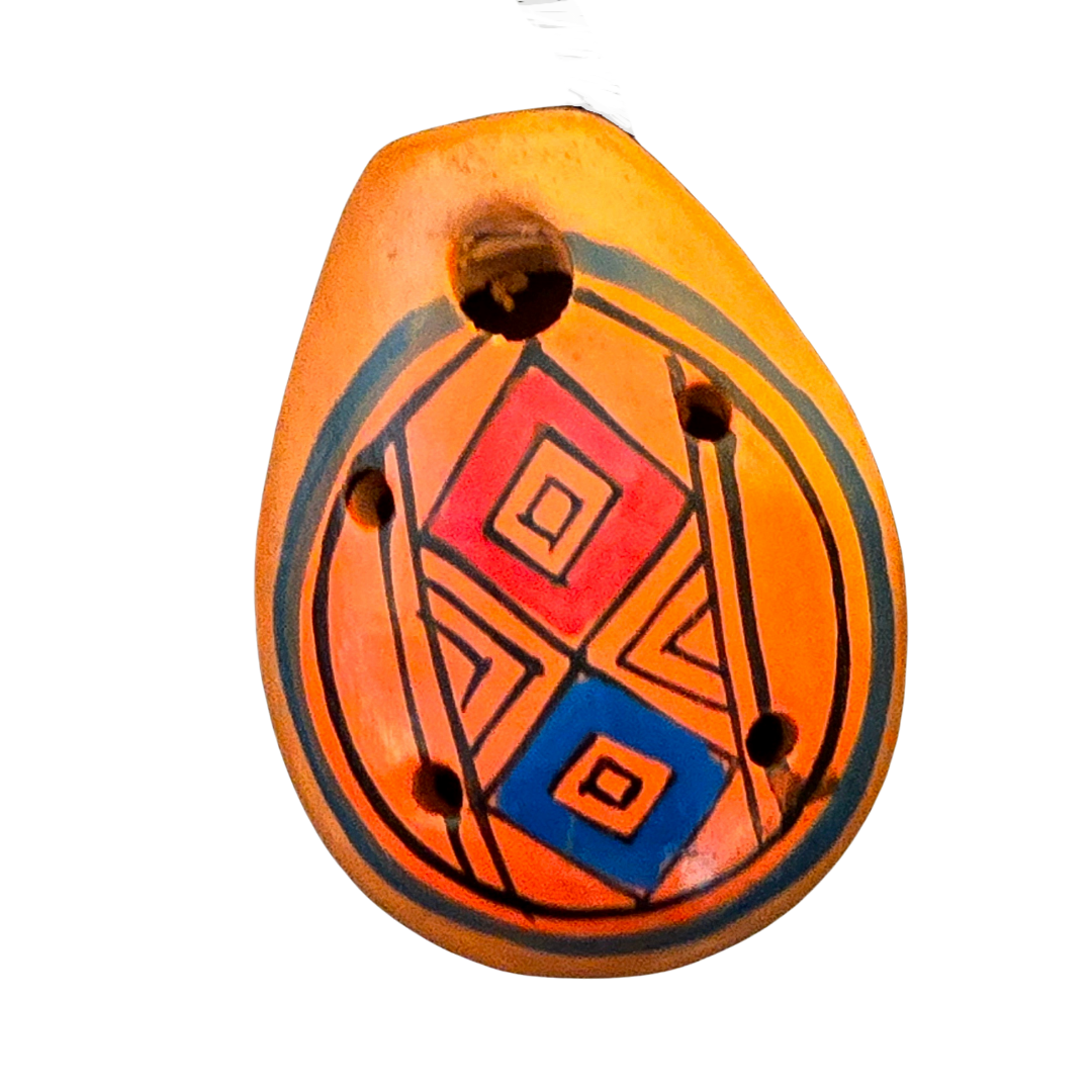 Small ocarina ceramic whistle with colorful Shipibo and geometric designs - made by a Peruvian Amazon artisan - Amazon Ecology