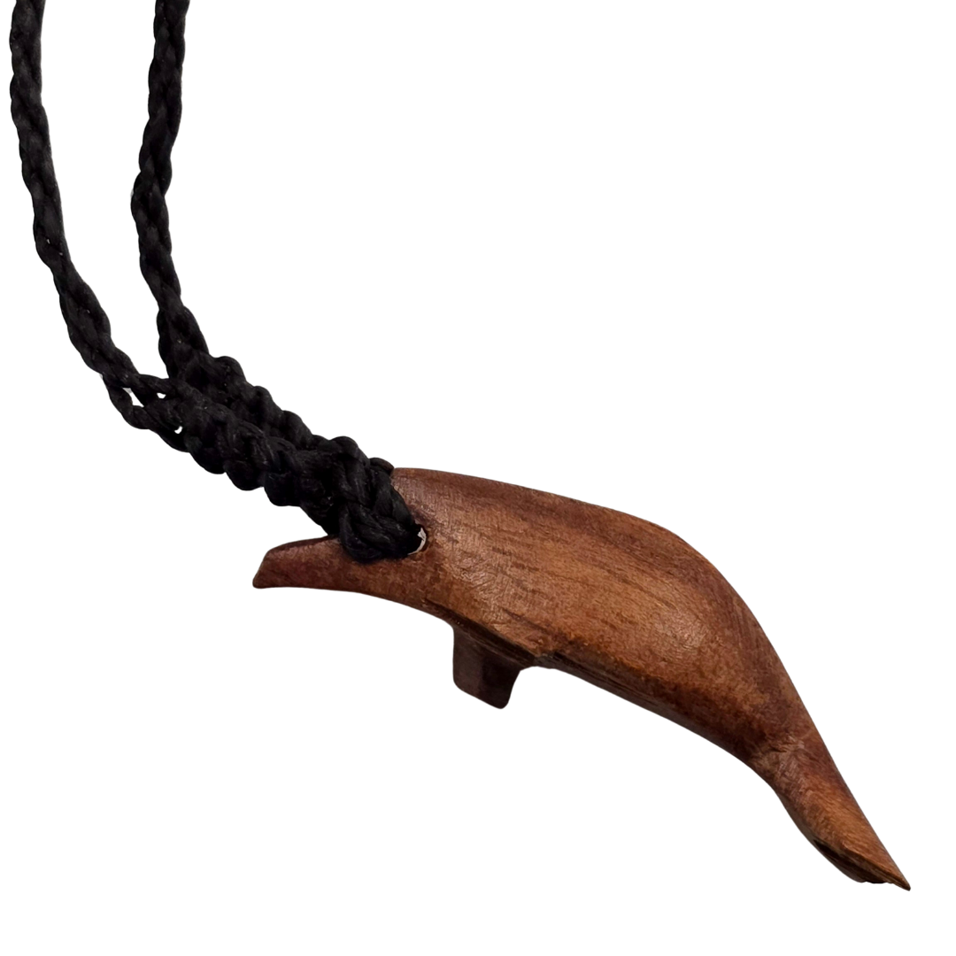 Carved tagua and palo sangre dolphin necklaces - made by artisans from the Peruvian Amazon - Amazon Ecology