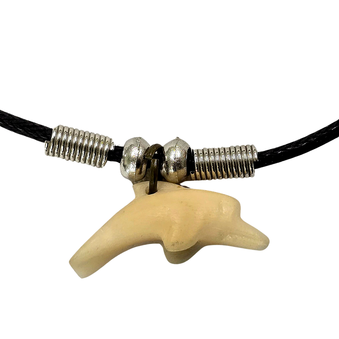 Carved tagua and palo sangre dolphin necklaces - made by artisans from the Peruvian Amazon - Amazon Ecology