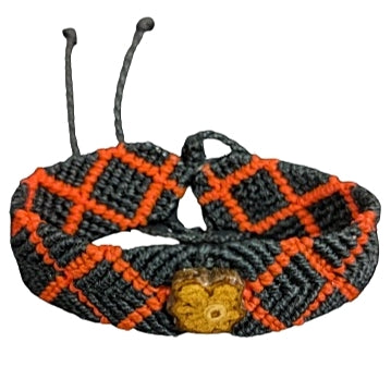 Black and orange bracelet with ayahausca - made by Peruvian Amazon artisan - Amazon Ecology