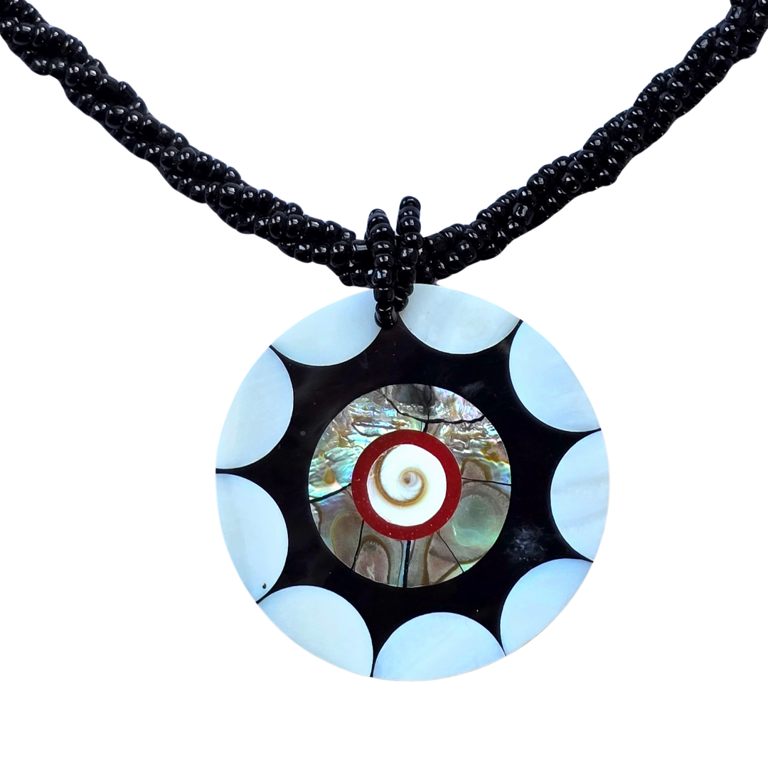 Black star abalone necklace from the Peruvian Amazon - Amazon Ecology