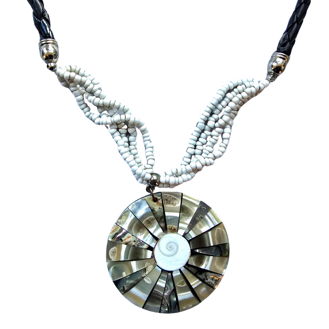 Mother of pearl sun shell necklace from the Peruvian Amazon - Amazon Ecology
