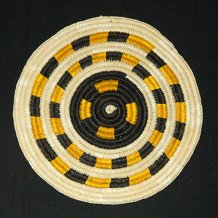 Woven hot pad (trivet) and center piece with black and yellow bands - Amazon Ecology