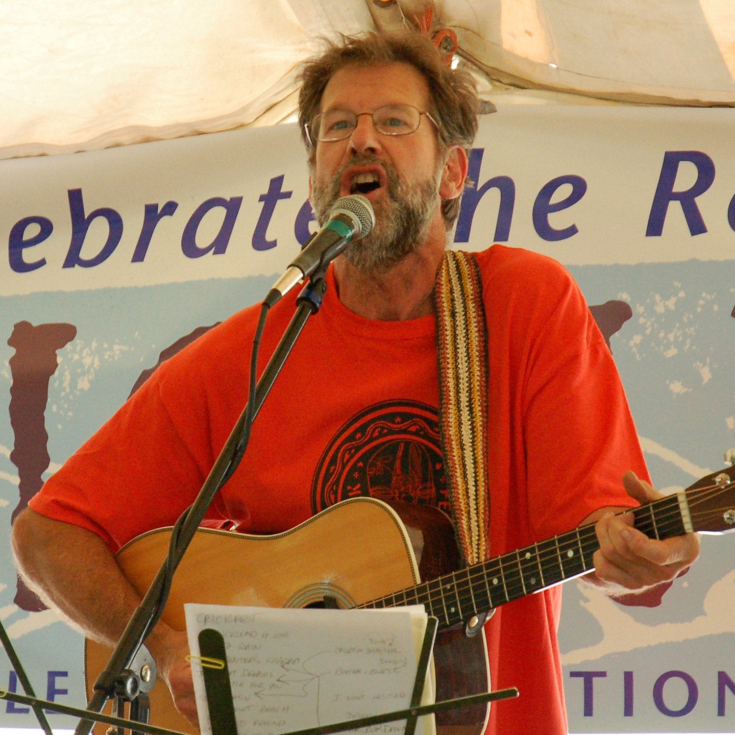 GS06A: Gary Gyekis with Amazon guitar strap at Crickfest - bushmaster model