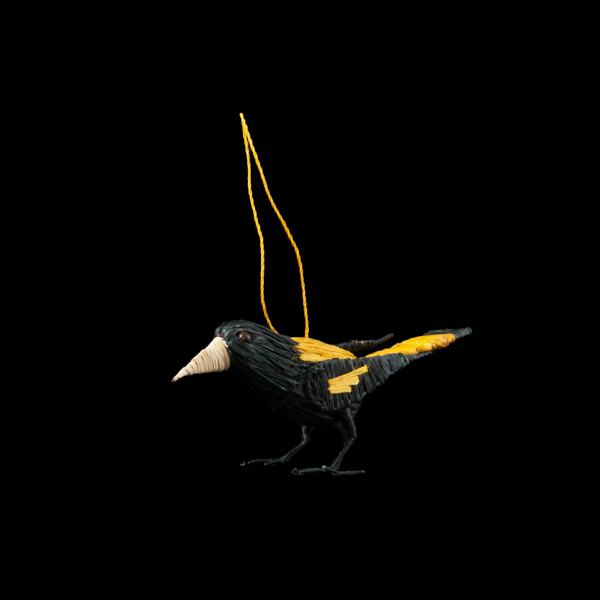 Yellow-rumped cacique and other yellow bird chambira ornaments - Amazon Ecology