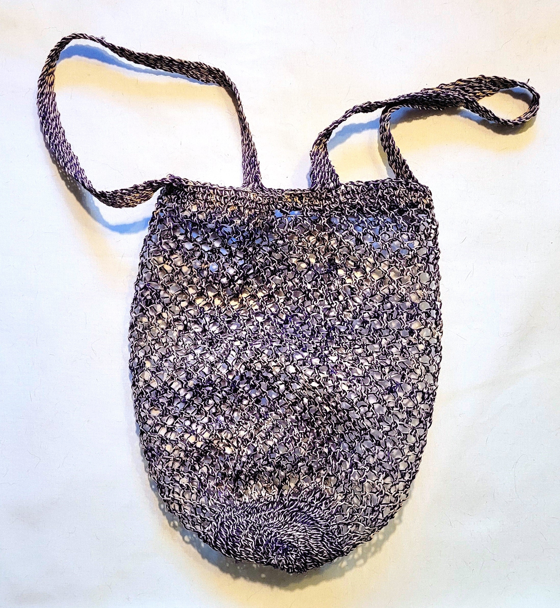 Two-handled round bottom fair trade chambira market bags made by Peruvian Amazon artisan - Amazon Ecology