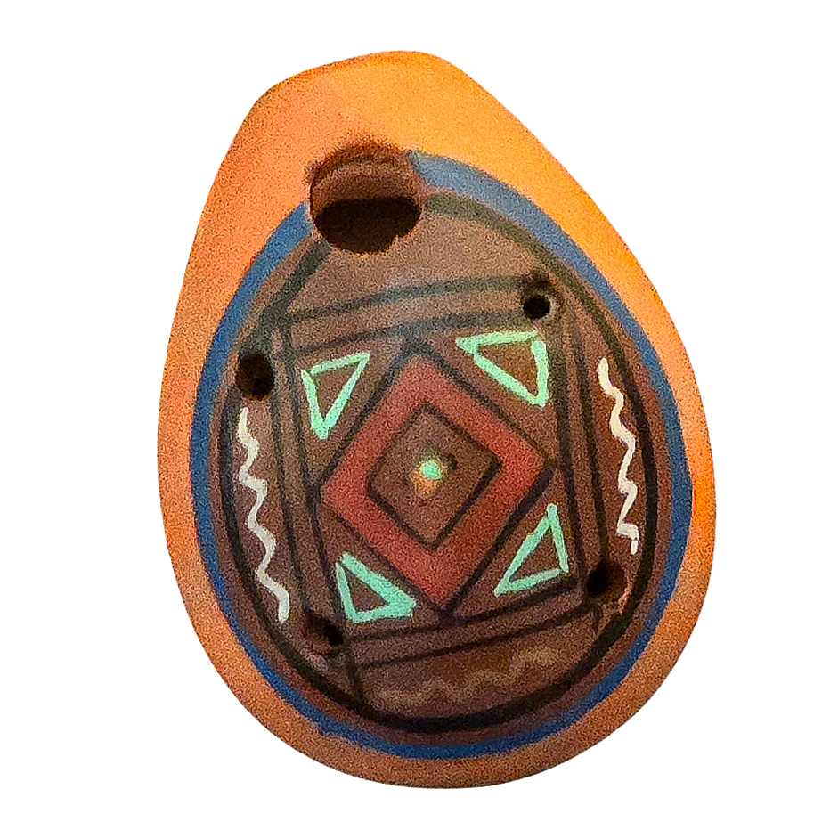 Small ocarina ceramic whistle with colorful Shipibo and geometric designs - made by a Peruvian Amazon artisan