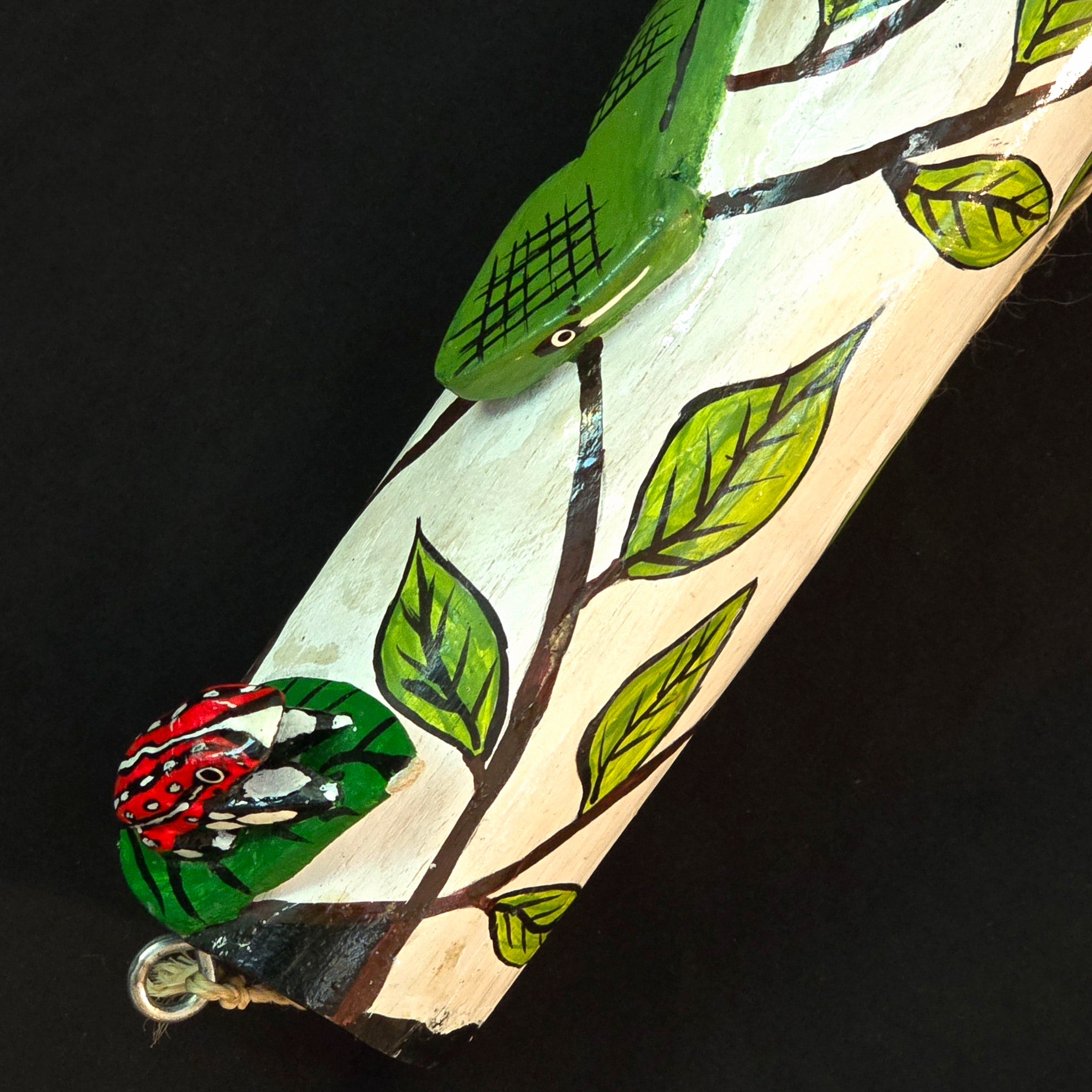 Wooden tropical snake on branch decoration - made by Peruvian Amazon artisan