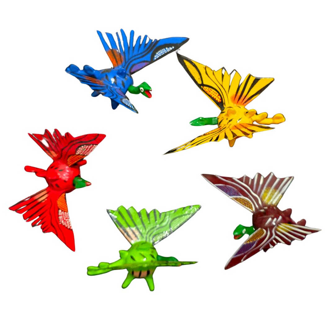 Bobble-head resin dragons - made by an artisan from the Peruvian Amazon