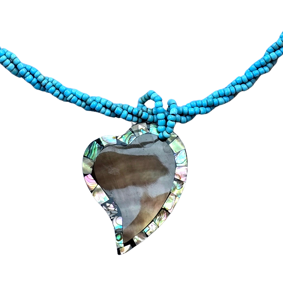 Heart shape shell necklace from the Peruvian Amazon - Amazon Ecology