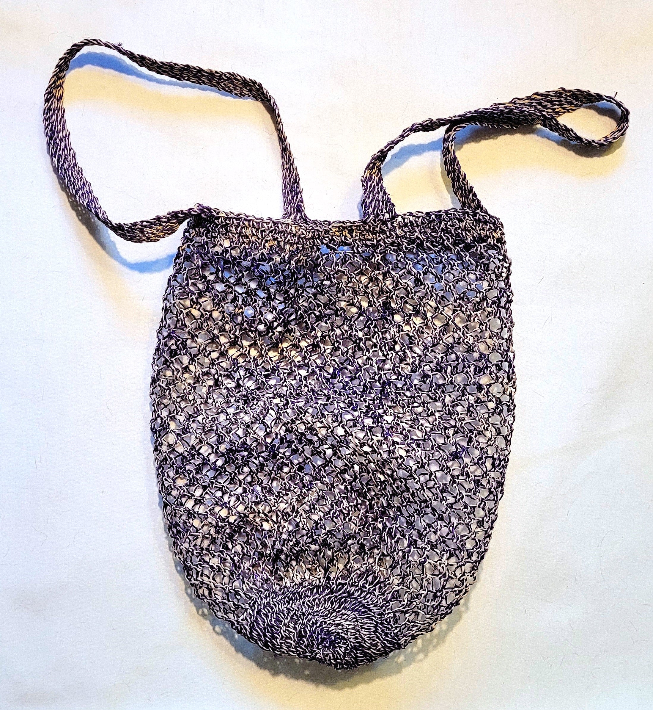 Two-handled round bottom fair trade chambira market bags made by Peruvian Amazon artisan