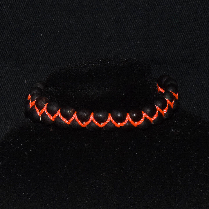 Three-row achira seed bracelet made by Peruvian Amazon artisan