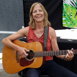 GS01A: Native artisan Colleen Kattau playing with Amazon guitar strap -