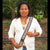 GS01G: Native artisan Monica Chichaco with custom Amazon anaconda guitar strap -