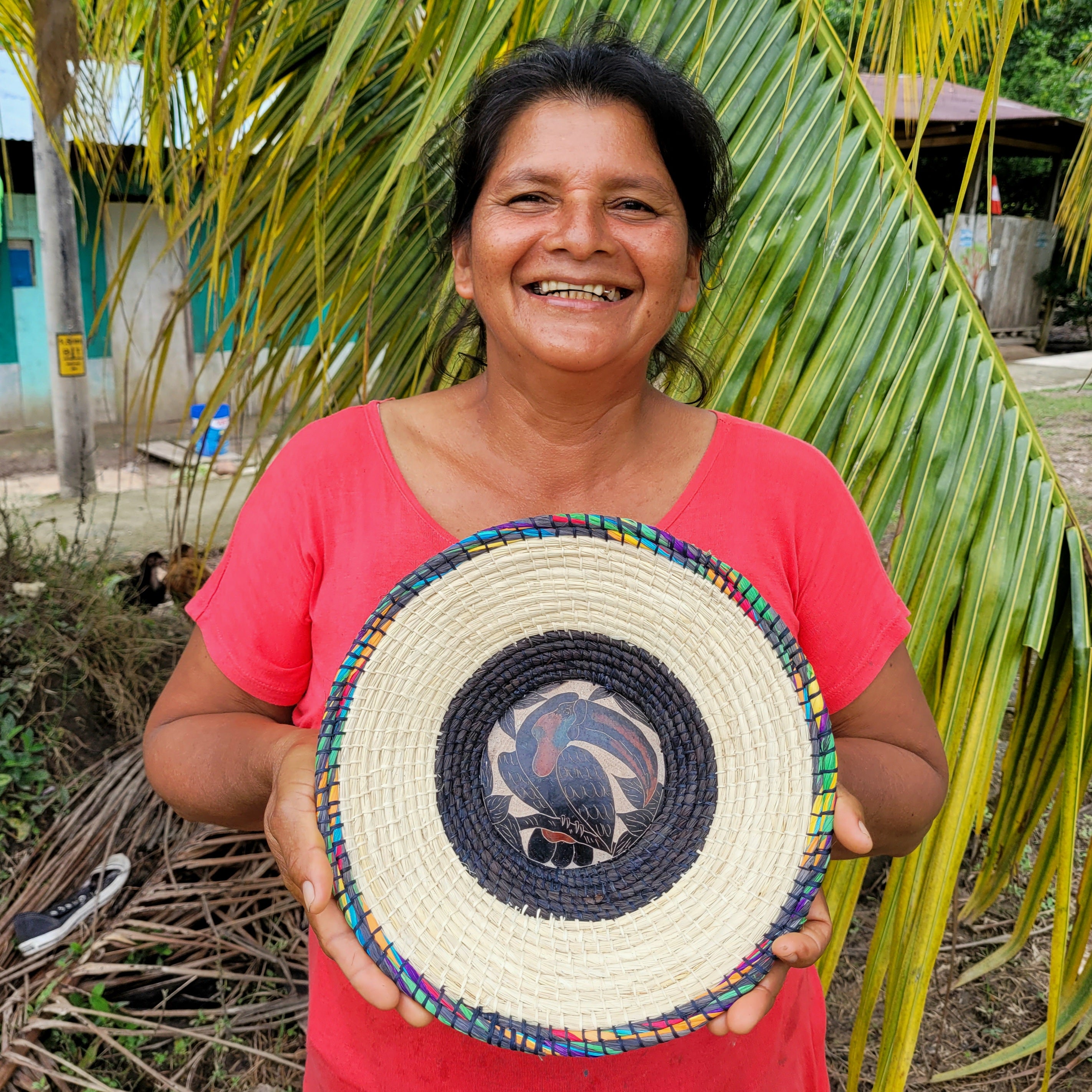 CHAMBIRA BASKET WITH WILDLIIFE CARVING ON CALABASH CENTER - MADE BY PERUVIAN AMAZON ARTISAN
